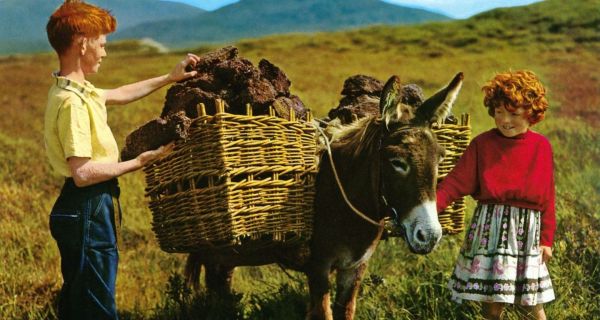 John Hinde postcard of children on a Connemara bog. Photograph: John Hinde Ireland.