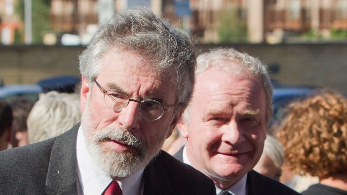 Gerry Adams and Martin McGuinness attend the Heaney funeral. Photograph: Liam McBurney/PA - image