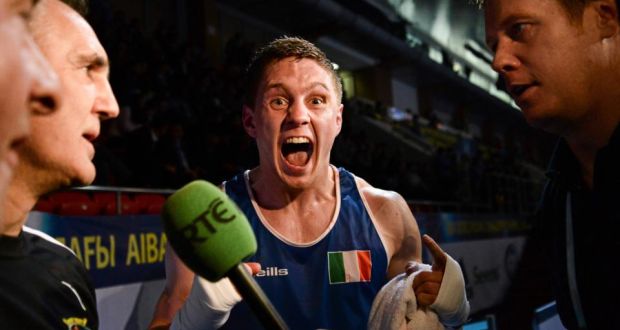 Jason Quigley celebrates beating <b>Artem Chebotarev</b> of Russia in their World <b>...</b> - image