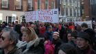 A section of the crowd listens to the speeches on Molesworth St. Photograph: Éanna Ó Caollaí/The Irish Times