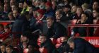 Manchester United manager David Moyes sits in the dugout during the  Premier League match against Manchester City  at Old Trafford. Photograph: Peter Byrne/PA 