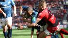 Munster’s Simon Zebo scores a try despite Toulon’s Drew Mitchell tackle during the Heineken Cup semi-final at the  Stade Velodrome in Marseille. Photograph: Billy Stickland/Inpho