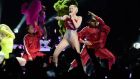 Miley Cyrus performing her raunchy stage show at the 02 in Dublin last night. Photograph; Dara Mac Dónaill