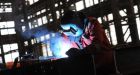 Titanic scale: a welder at work in one of the shipyard’s huge sheds. Photograph: Stephen Davison/Pacemaker