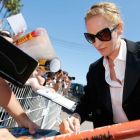 ‘For the purposes of this column we are going to pretend that what sets us apart from aardvarks, horseshoe crabs and cormorants is our ability (not always exercised) to stand in orderly queues. These words are triggered by long hours standing between ropes in blazing sunlight at the Cannes Film Festival.’ Above, Uma Thurman signs autographs for fans on the Croisette. Photograph: Regis Duvignau/Reuters 