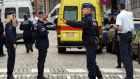 Police officers cordon off the area of shooting near the Jewish Museum in Brussels, Belgium. Photograph: Stephanie Lecocq/EPA