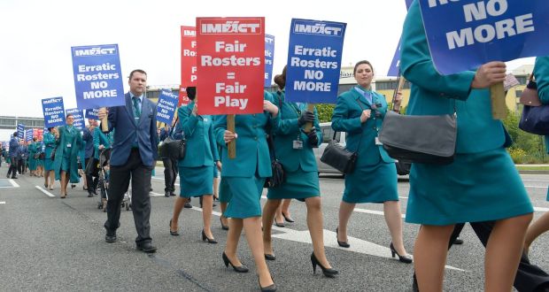 Aer Lingus pilots and cabin crew on strike over their rosters photographed marching at Dublin Airport