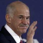 Greece’s then prime minister George Papandreou (the second) at a meeting of world leaders in Canne in November 2011. Even the Papandreou family charisma could not prevent his exit from politics. Photograph: Yves Herman/Reuters