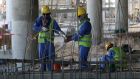 Migrant labourers work on a construction site last October in Doha in Qatar. Photograph: AFP 