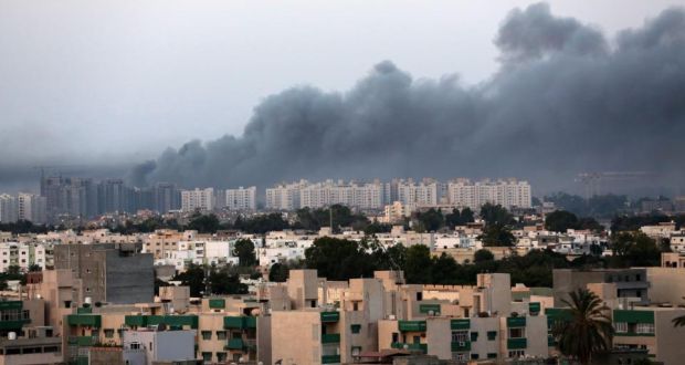 Smoke fills the sky over Tripoli after fighting between rival militias. Photograph: EPA/STR