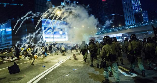 Hong Kong police use tear gas to try and disperse protestors