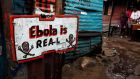 An Ebola sign outside a home in West Point slum area of Monrovia, Liberia. Ireland has provided direct funding of almost €4 million for Ebola treatment facilities in Sierra Leone and Liberia. Photograph: EPA/Ahmed Jallanzo