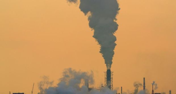 Smoke billowing from a plant in Tokyo bay. The 9.6 per cent annual rise in exports in October was more than double the 4.5 per cent gain expected by economists