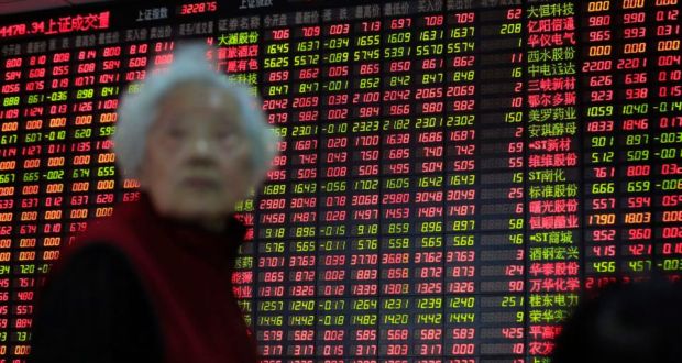 China stocks closed up more than 2 per cent on Wednesday, boosted by a late afternoon rally which helped the stock market become the best performer among major global bourses this year. (Photograph: Aly Song/Reuters)