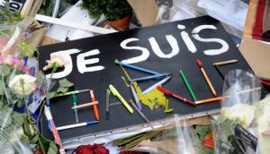 Yvette Dolan-Collins: ‘Collecting my children from school on the day of the Charlie Hebdo attack, I had no choice but to skirt a police cordon of red and white tape... It was surreal, like stepping onto a film set.’ Photograph: Capucine Granier-Deferre/The New York Times