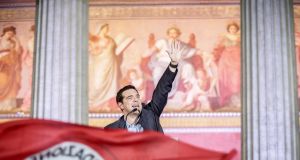 Alexis Tsipras, opposition leader and head of radical leftist Syriza party, greets supporters after his party's victory in the Greece general elections in Athens, Greece, 25th  January 2015. Photograph: EPA/MICHAEL KAPPELER