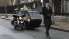 Motorbike fanatics are now able to get the ultimate send-off thanks to Massey Bros funeral directors, who have   purchased Ireland’s first Harley-Davidson hearse in response to growing demand.  Picture  shows John Gibson of Massey Bros on a customised Harley-Davidson Electra Glide hearse, with Massey Bros business manager Peter Maguire in front. The  hearse will make its debut at the Irish Motorbike & Scooter Show  this weekend at the RDS. Photograph: Brenda Fitzsimons/The Irish Times