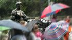  Tourists take in the Molly Malone statue in College Green, Dublin.  Photograph by Matt Kavanagh/The Irish Times