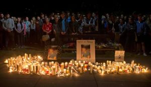 Remembrance: the service in San Diego was one of many in California to pay tribute to the students who died, including this vigil in Berkeley. Photograph: Beck Diefenbach/AP