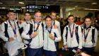 Ireland team members return to Dublin Airport from the European Games in Baku. Medal winners (from left); Seán McComb, Joshua Magee, Michael O’Reilly, Katie Taylor, Sam Magee, Brendan Irvine and Chloe Magee. Photograph: Dara Mac Dónaill