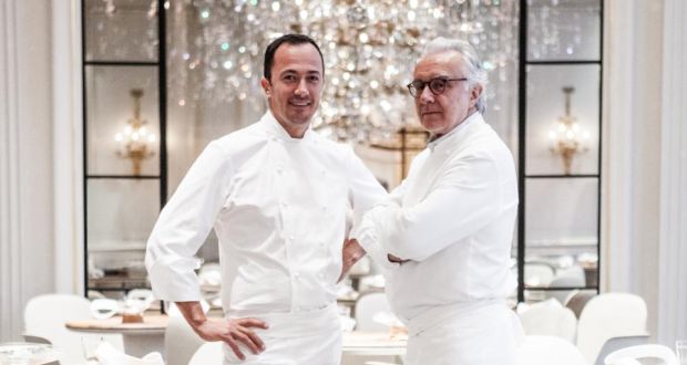 Alain Ducasse (right),  with sous chef Romain Meder at the Plaza Athénée, is one of 37 top chefs swapping their restaurant for a mystery one where they will cook dinner tomorrow evening. Photograph: Pierre Monette 