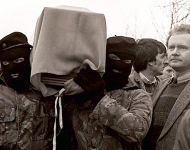 Martin McGuinness with masked IRA men at the funeral of Brendan Burns in 1988. File photograph: Pacemaker