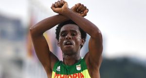 Ethiopia’s Feyisa Lilesa crossed his arms at the finish  of the men’s marathon in the  Rio 2016 Olympics  as a protest against the Ethiopian government’s crackdown on political dissent. Photograph:  Olivier Morin/AFP