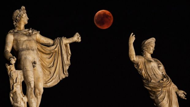   told Reuters. The moon of blood eclipses next to the sun. a statue of the Greek gods Hera and god Apollo.The center of Athens on July 27, 2018. Photo: Aris Messinni / AFP / Getty Images 