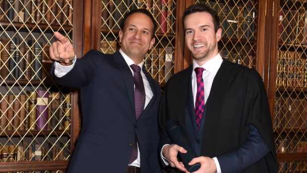 Dr. Matthew Barrett, after graduating from a specialized course in cardiology at the Royal College of Physicians, with his partner, Taoiseach Leo Varadkar.