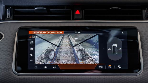 The Evoque is Land Rover's first "transparent hood" technology car, which uses forward and downward-facing cameras to project an image of what's under and in front of the car on a screen, which facilitates maneuvering in tight spaces.