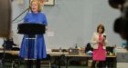 Ruth Coppinger makes her acceptance speech at Joan Burton looks on at the Dublin West Count centre at Phibblestown near Ongar. Photograph: Alan Betson 