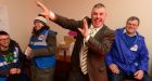 Kevin Boxer Moran in his office with his wife,  Michelle Fagg Moran, before canvassing in the Coosan area of Athlone. Photograph: Cyril Byrne 