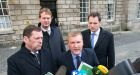 The Fianna Fail negotiating team of Barry Cowan, Jim O’Callaghan, Michael McGrath, Charlie McConalogue outside Trinity College Dublin Friday evening after talks with Fine Gael on forming a government concluded. Photograph: Dave Meehan/The Irish Times