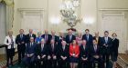  President Michael D. Higgins (centre)and Taoiseach Enda Kenny (third left), with newly elected Cabinet  members, at Áras an Uachtaráin on Friday night following the formation of a government 70 days after the general election. Photograph: PA 