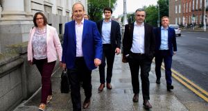 Fianna Fáil leader Micheál Martin and his team arrive at Government Buildings.Photograph: Gareth Chaney/Collins