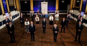 President Michael D Higgins presents the new Ministers with their seals of office. Photograph: Maxwells
