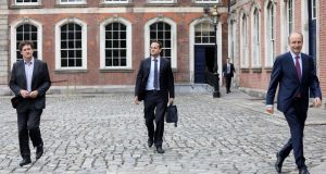 Green Party leader  Eamon Ryan, Fine Gael leader Leo Varadkar and Fianna Fáil  leader Micheál Martin arriving at Dublin Castle on Monday. Photograph: Julien Behal/PA Wire