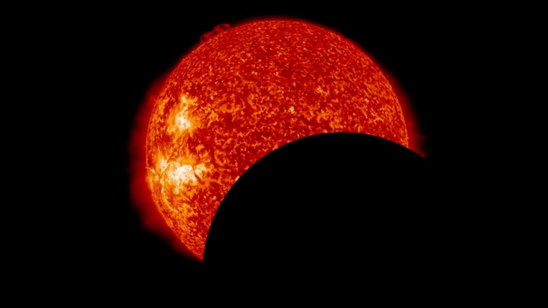 Video captures eclipse and solar flare