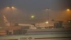 A British Airways plane on the ground at Heathrow Airport Terminal 5, as dozens of flights have been cancelled at the airport due to thick fog. Photograph: PA