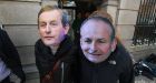  Protesters wearing masks of Enda Kenny  and Micheál Martin.  The difficulties of bringing the two parties together are underrated. Photograph: Nick Bradshaw