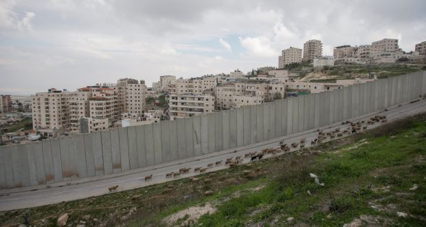 An Israeli wall separating the Palestinian refugee camp of Shuafat from an East Jerusalem neighbourhood. Israel and the US strongly rejected the UN report. Photograph: Atef Safadi/EPA