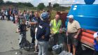 People queuing for water in Termonabbey on the outskirts of Drogheda, Co Louth. Photograph: Cyril Byrne/The Irish Times. 