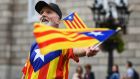 An independence supporter outside the Palau Catalan Regional Government Building in Barcelona earlier this week. Photograph: Jeff J Mitchell/Getty