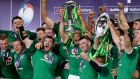Ireland captain Rory Best  lifts the Six Nations trophy after they clinched the Grand Slam by beating England 24-15 at Twickenham. Photograph: Will Oliver/EPA