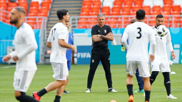 Carlos Queiroz’s Iran could achieve improbable qualification for the last-16 with victory over Portugal. Photograph: Rungroj Yongrit/EPA