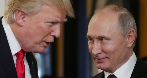 US President Donald Trump chats with Russia’s President Vladimir Putin as they attend the APEC Economic Leaders’ Meeting in the central Vietnamese city of Danang on November 11th, 2017. Photograph: Mikhail Klimentyev/AFP/Getty Images.