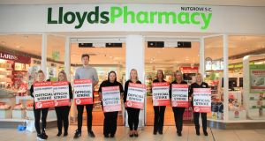 pharmacy lloyds strike action further nutgrove garrett centre photograph shopping staff plan irish mandate picketing rathfarnham union trade members june