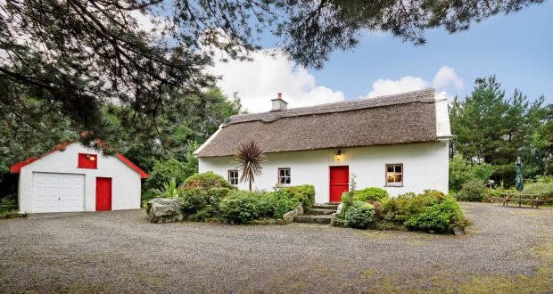 Escape To This Gorgeous Thatched Fishing Lodge On The Shores Of