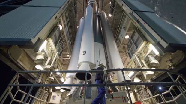 Workers prepare the United Launch Alliance (ULA) Delta II rocket, with the Nasa Ice, Cloud and land Elevation Satellite-2 (ICESat-2) on board, for launch. Photograph: Bill Ingalls/Nasa/Getty Images