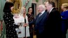 The President, Michael D  Higgins meets   the newest member of the Humanist Association of Ireland, Zoe, and her mother, Selina Campbell,  at the association’s 25th anniversary  celebrations. Photograph:  Maxwell’s 